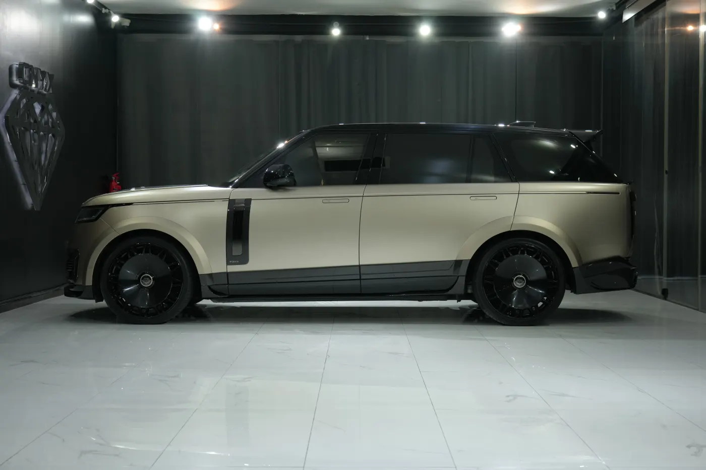 Unrivaled Land Rover Range Rover Aspen SVX Shadow Edition Onyx Concept Long Wheelbase featured prominently at Dubai luxury automobile showroom