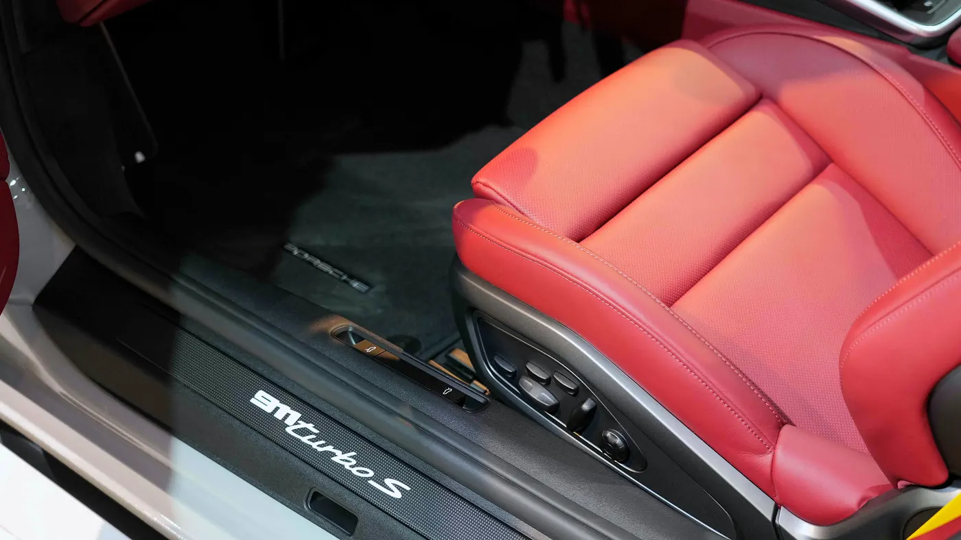 Experience Porsche 911 Turbo S Cabriolet with twin-turbocharged acceleration and open-top design
