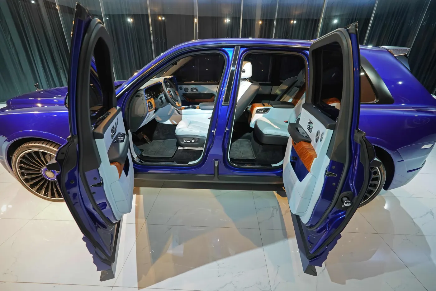 Rolls-Royce Cullinan by Onyx Concept Deep Salamanca Blue ultra-luxury custom SUV for sale in Dubai showroom