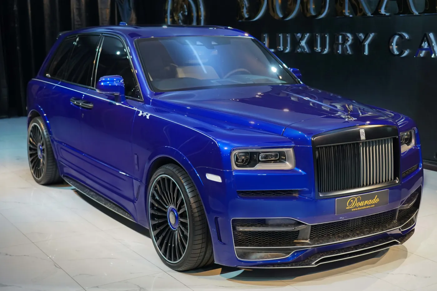 Command the road with commanding widebody stance in Rolls-Royce Cullinan by Onyx Concept Deep Salamanca Blue in Dubai UAE