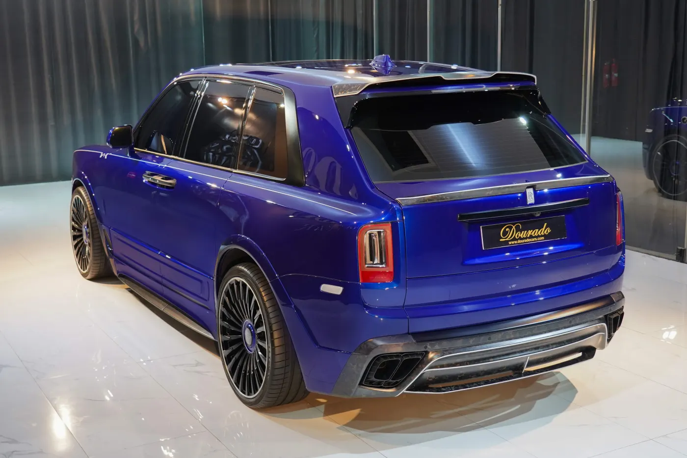 Rolls-Royce Cullinan by Onyx Concept Deep Salamanca Blue sophisticated widebody SUV showcased in the heart of UAE